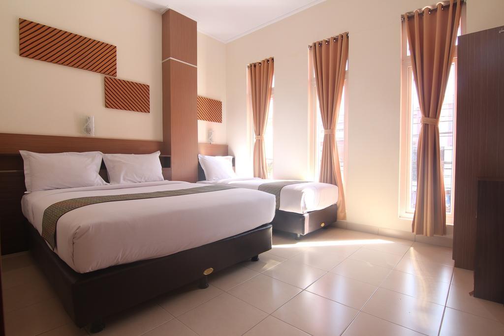 Hotel Pules Джокьякарта Номер фото